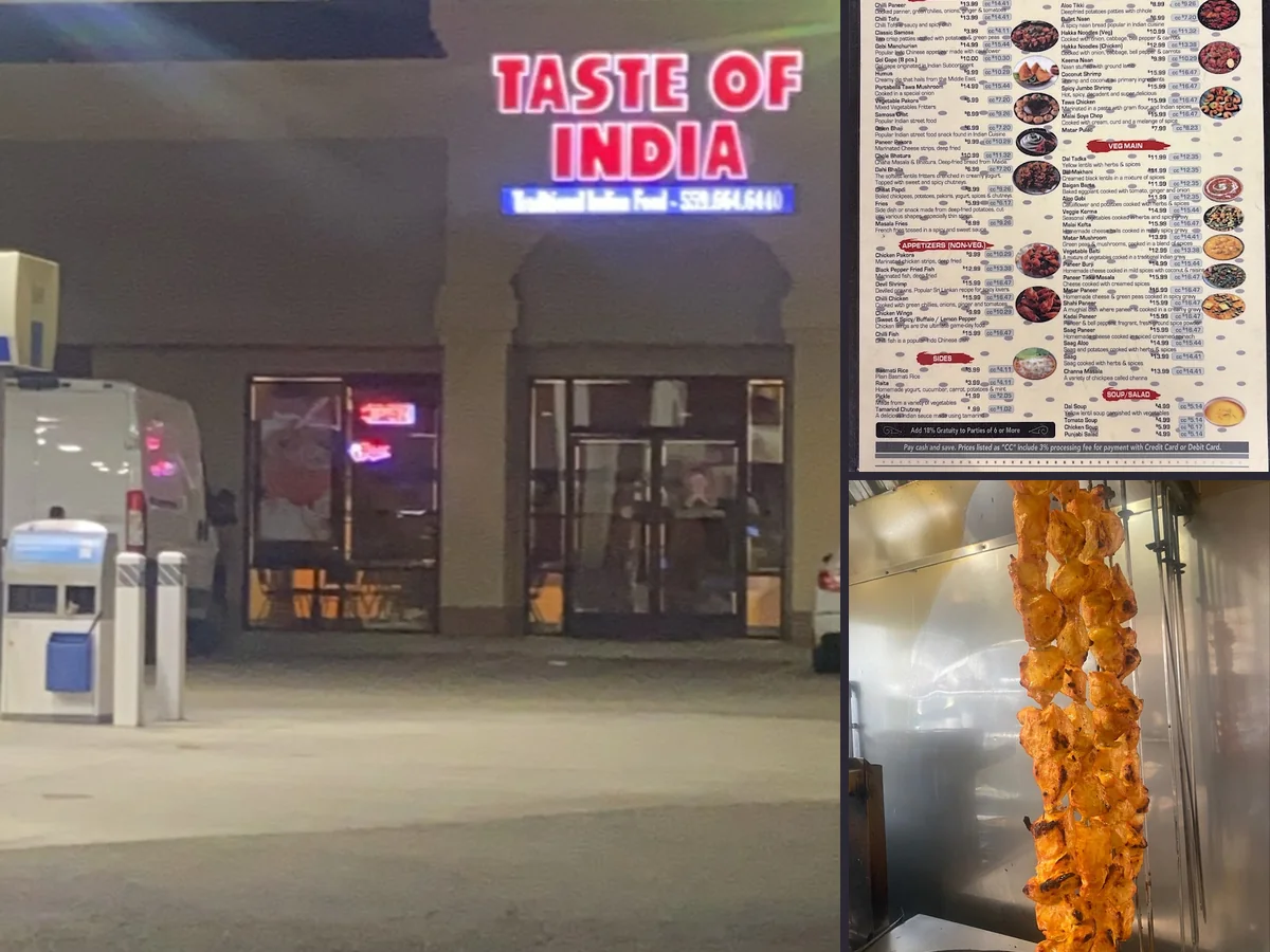 Indian restaurant interior with dining tables and warm lighting.